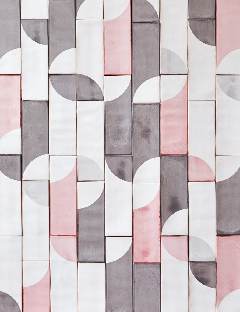 Smink Studio Toucan screen-printed tiles: vertical handmade tiles in pink, grey, charcoal and white with half-circles.