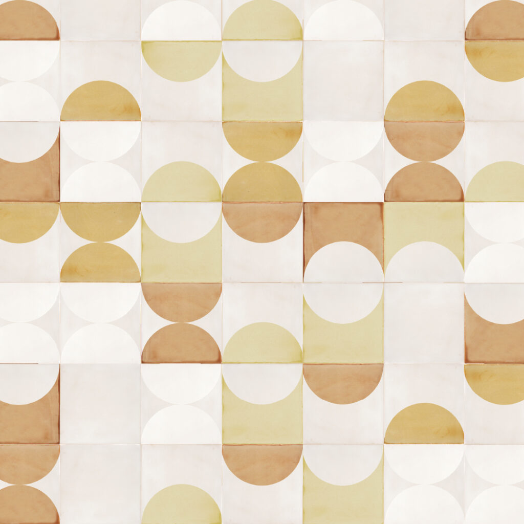Smink Studio Eclipse pattern: white handmade tiles with screen-printed half-circles in mustard, ochre and caramel.
