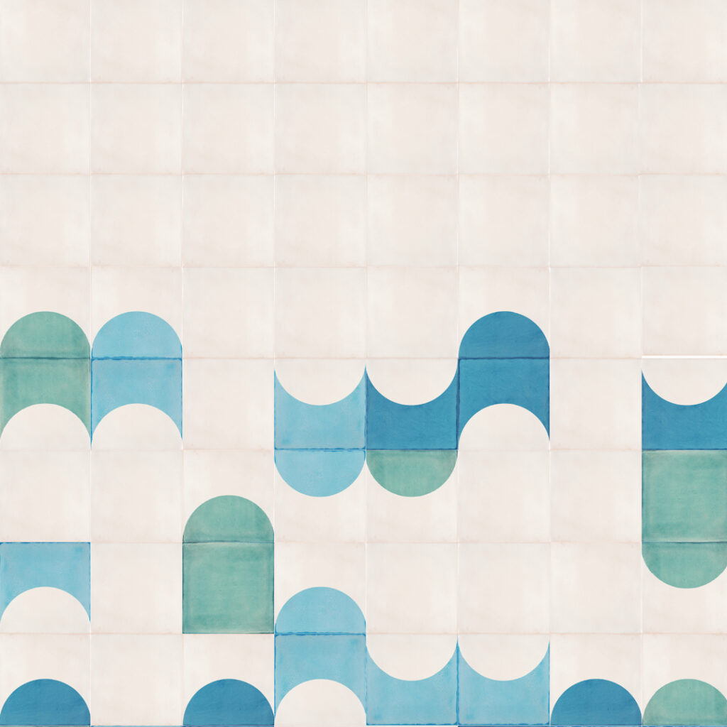 Smink Studio Bubblebath design in shallow blue: white tiles with a low band of screen-printed half-circles in blue and teal.