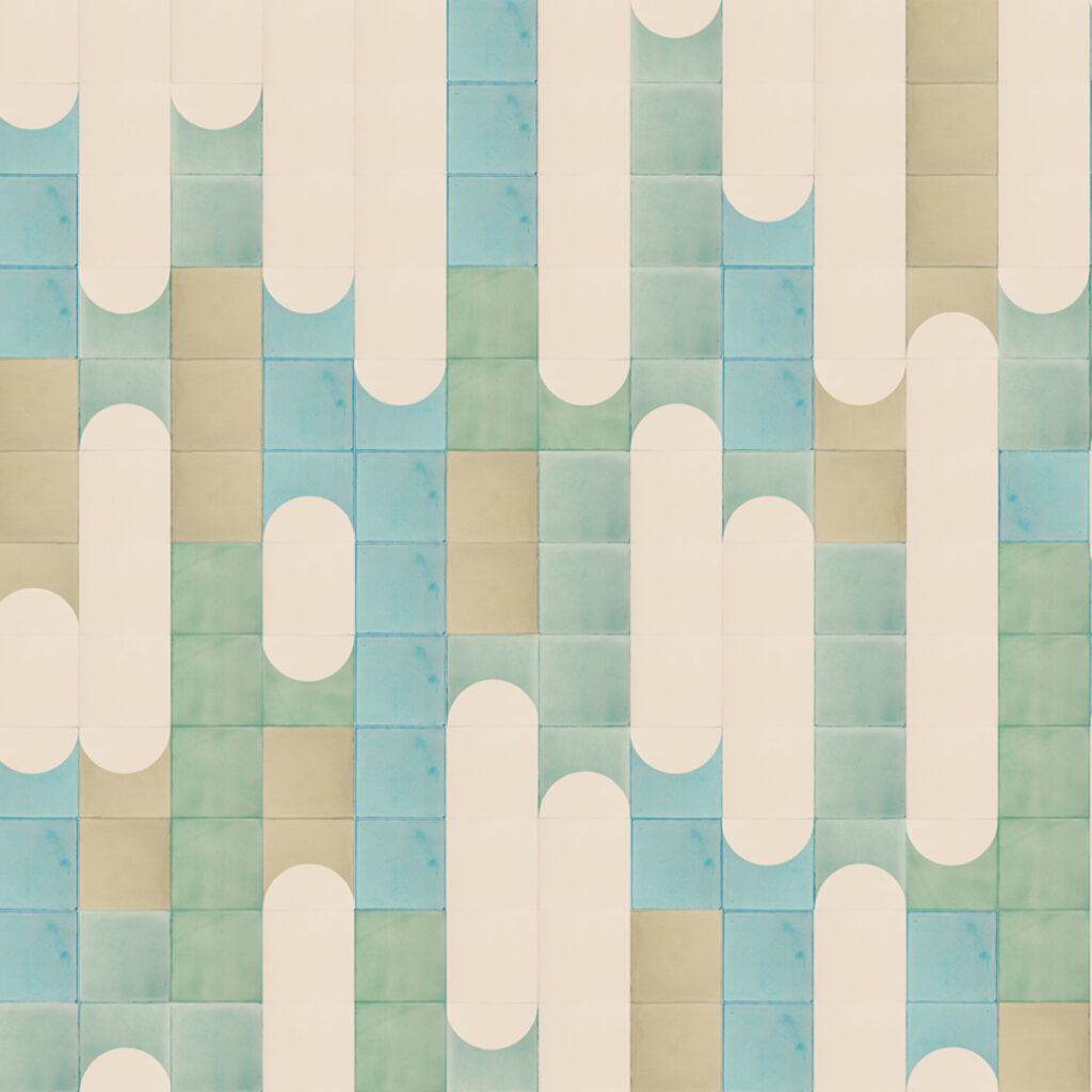 Smink Studio Waterfalls design in blue and green: screen-printed cream arches over handmade tiles in sky blue, sage and olive.