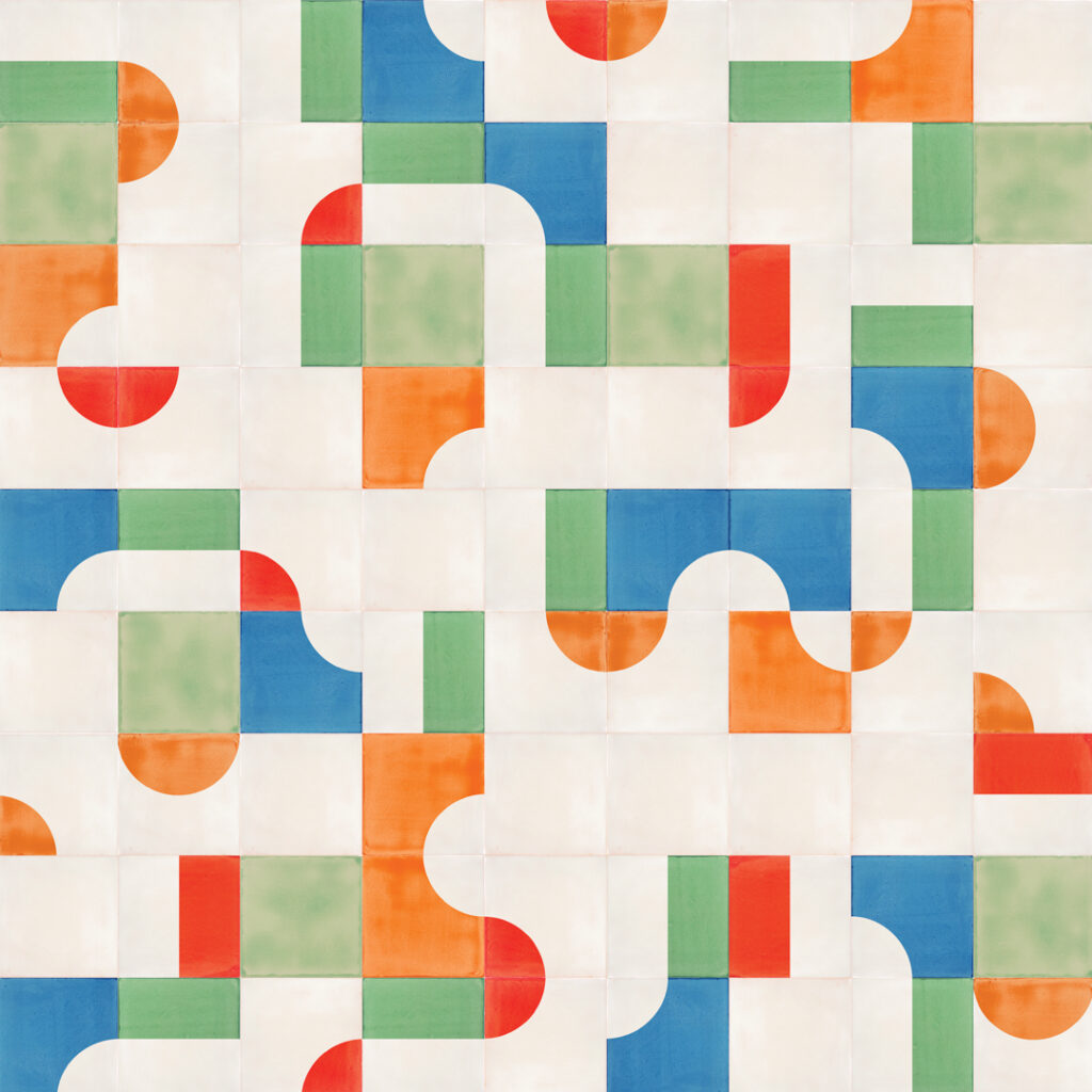 Smink Studio design in blue, green, orange and red: white handmade tiles with bold screen-printed bands and curves.