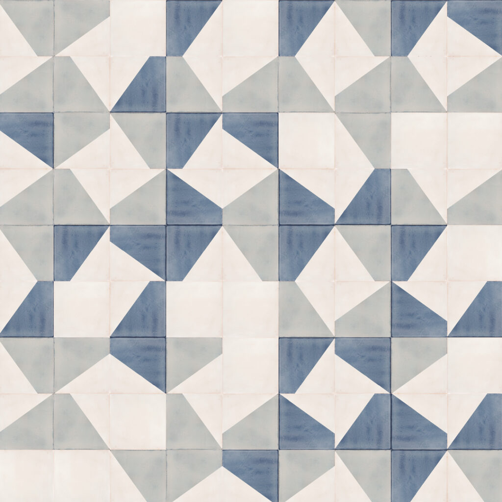 Smink Studio Gathers No Moss pattern: cream glazed ceramic tiles with screen-printed triangles in navy and soft grey.