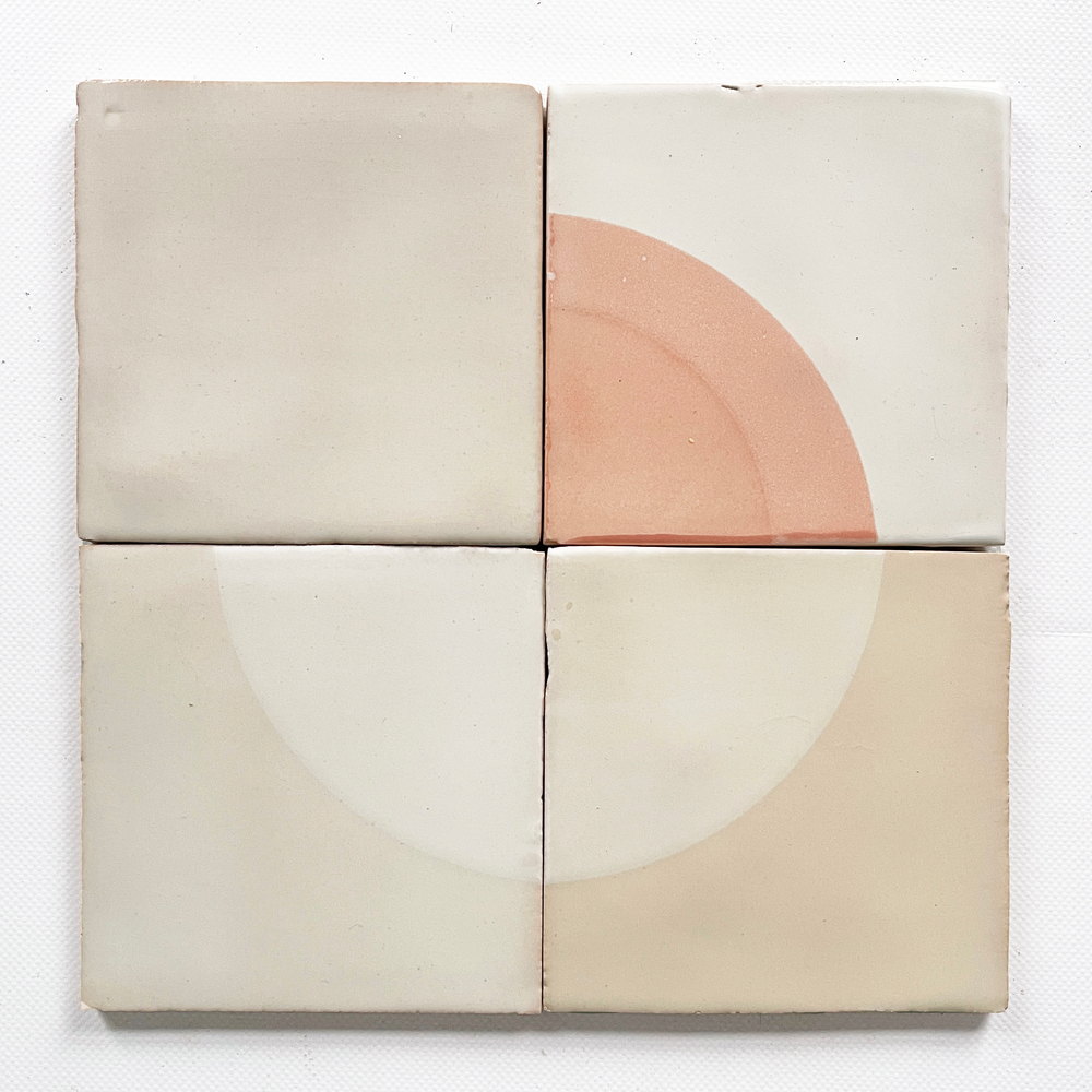 Four Smink Studio tiles in white and cream with a soft blush quarter-circle and a pale ivory circle, screen-printed in barely contrasting tones.