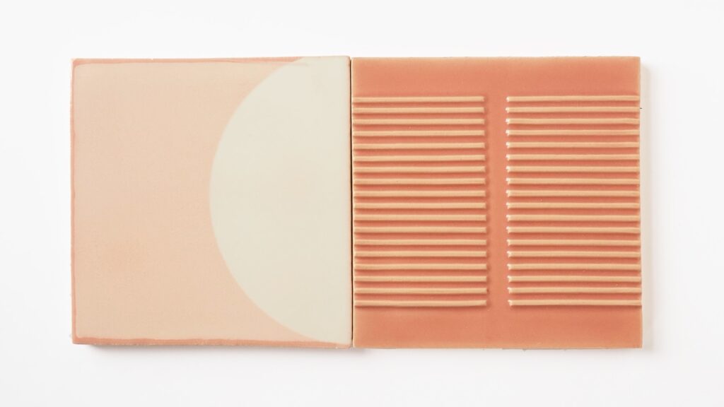 A screen-printed tiles on the left and a Relief tile on the right